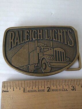 Raleigh Lights Belt Buckle Brass